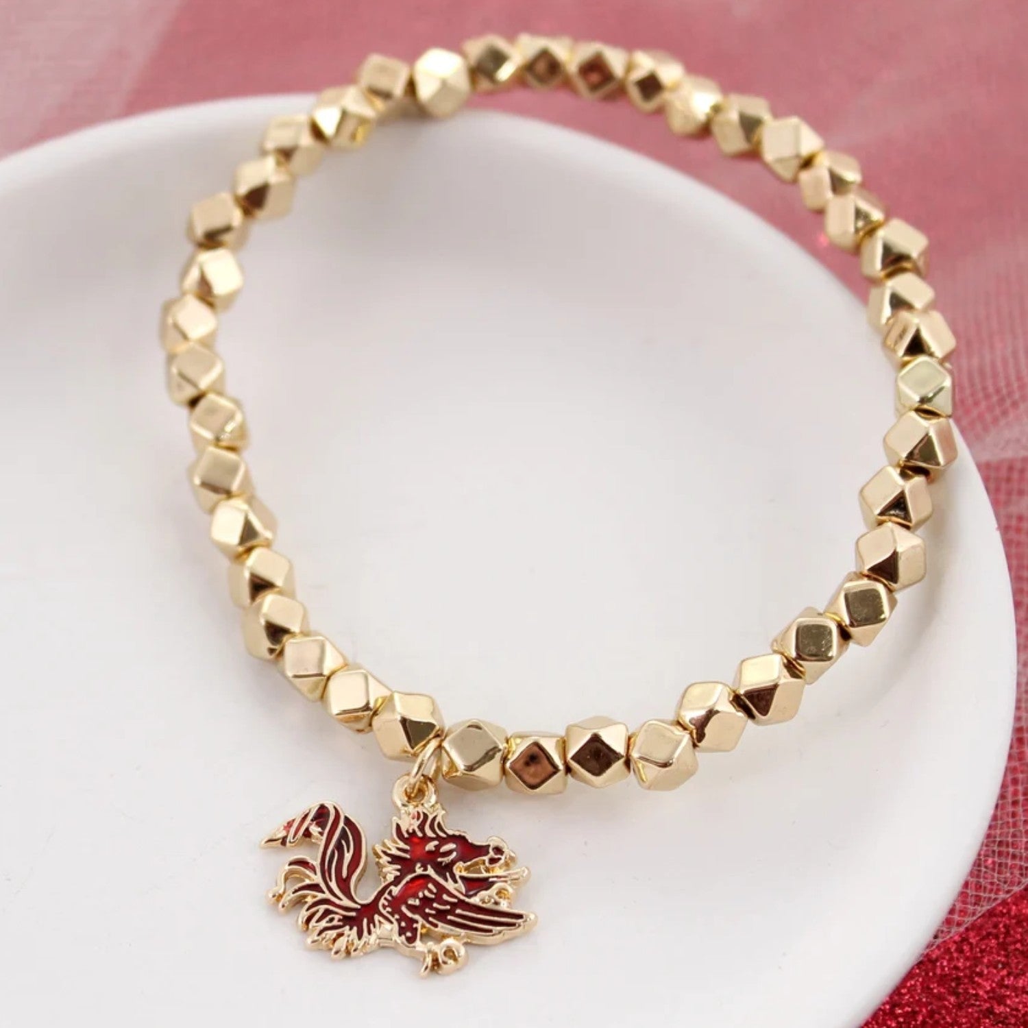 SOUTH CAROLINA GAMECOCKS GOLD TONE GAMECOCK DANGLE STRETCH BEAD BRACELET